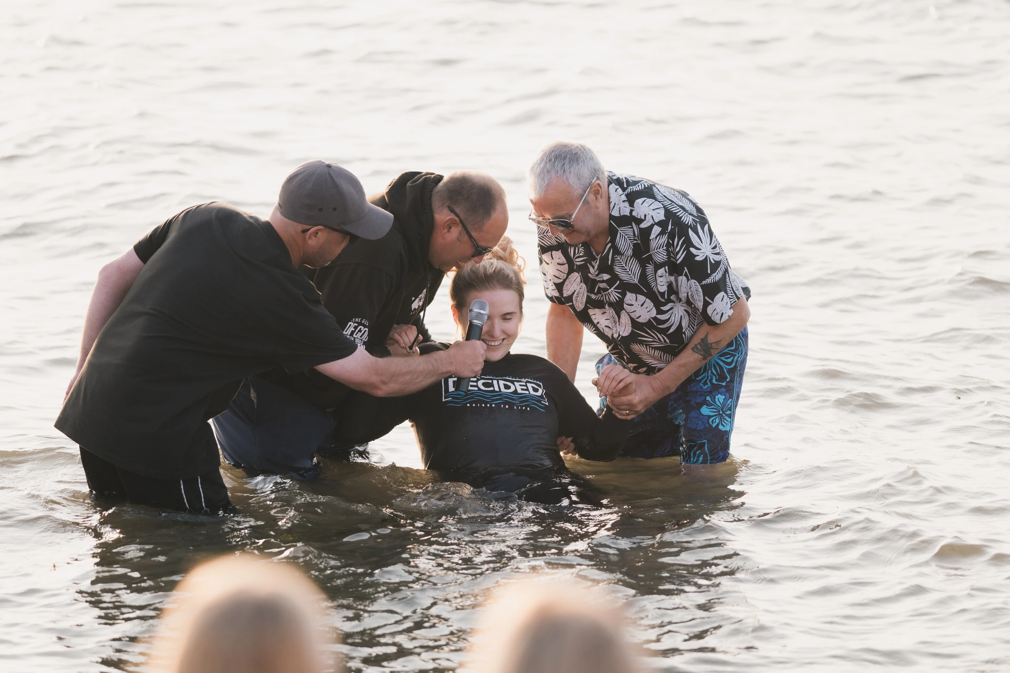 christian baptism ceremony in the water