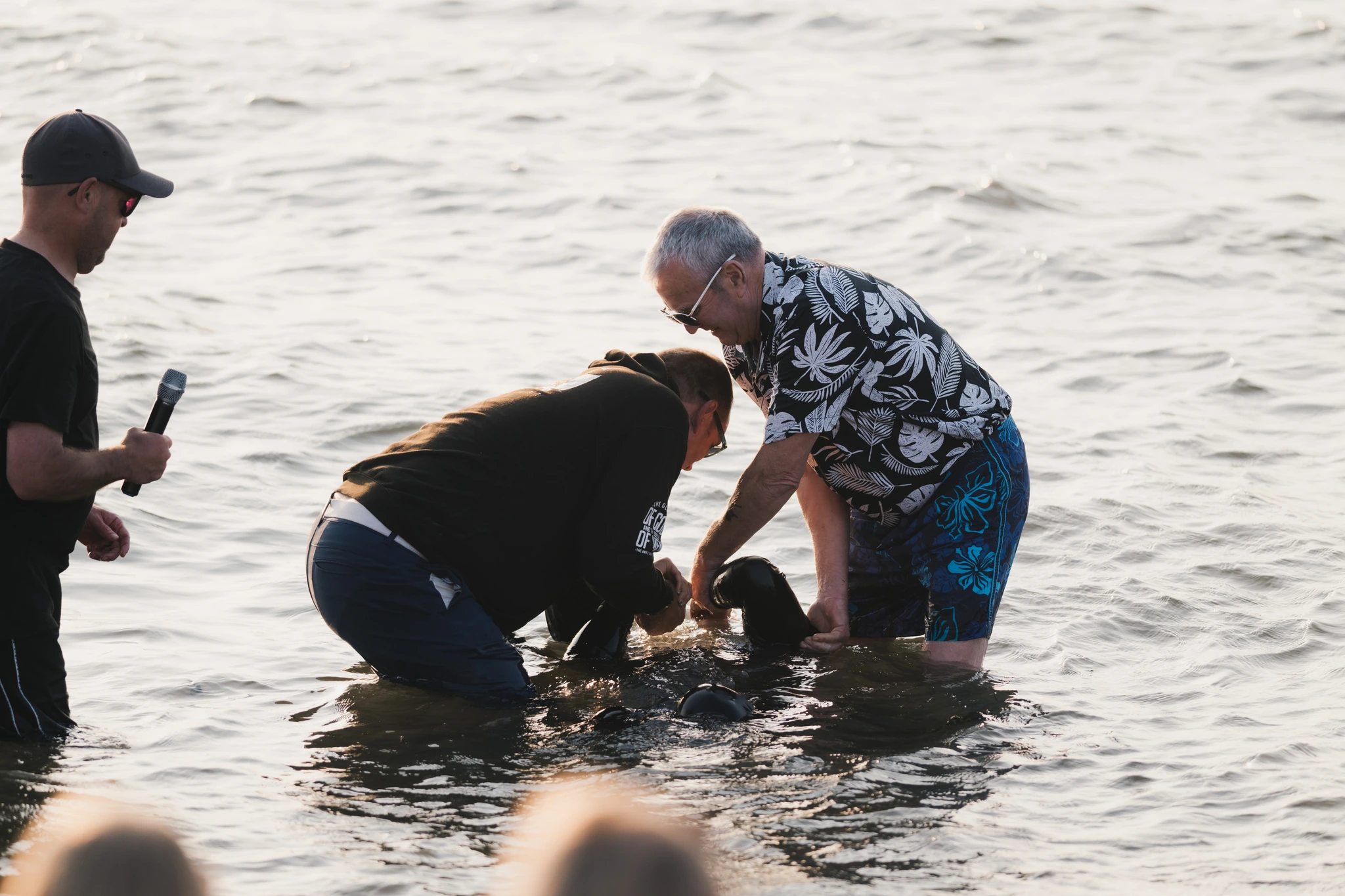 christian baptism of a baby in the water
