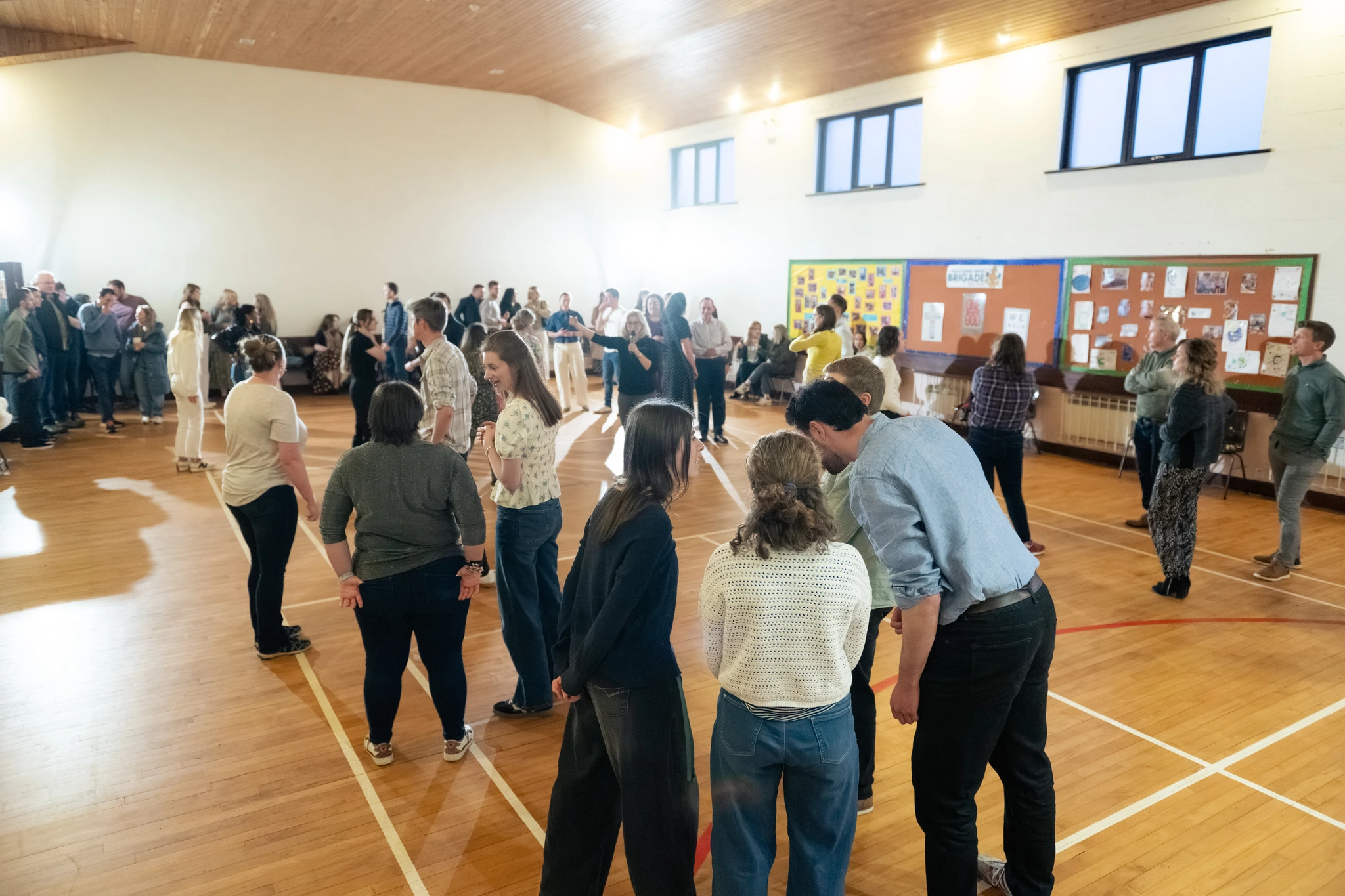 a group of people standing in a circle