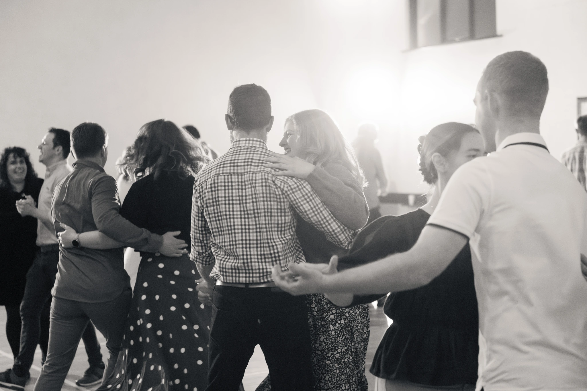 a group of people dancing in a dance class