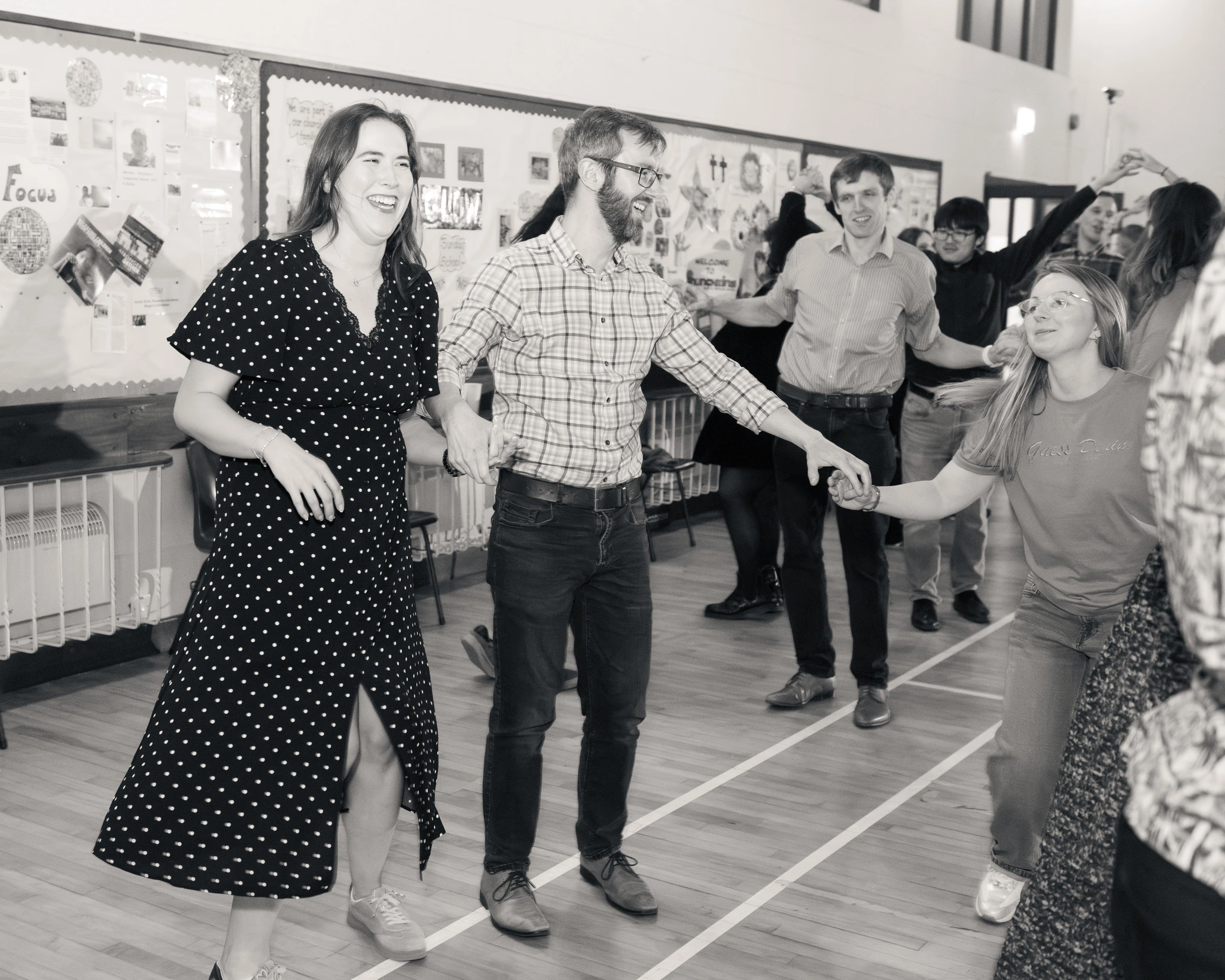 a group of people dancing in a dance floor