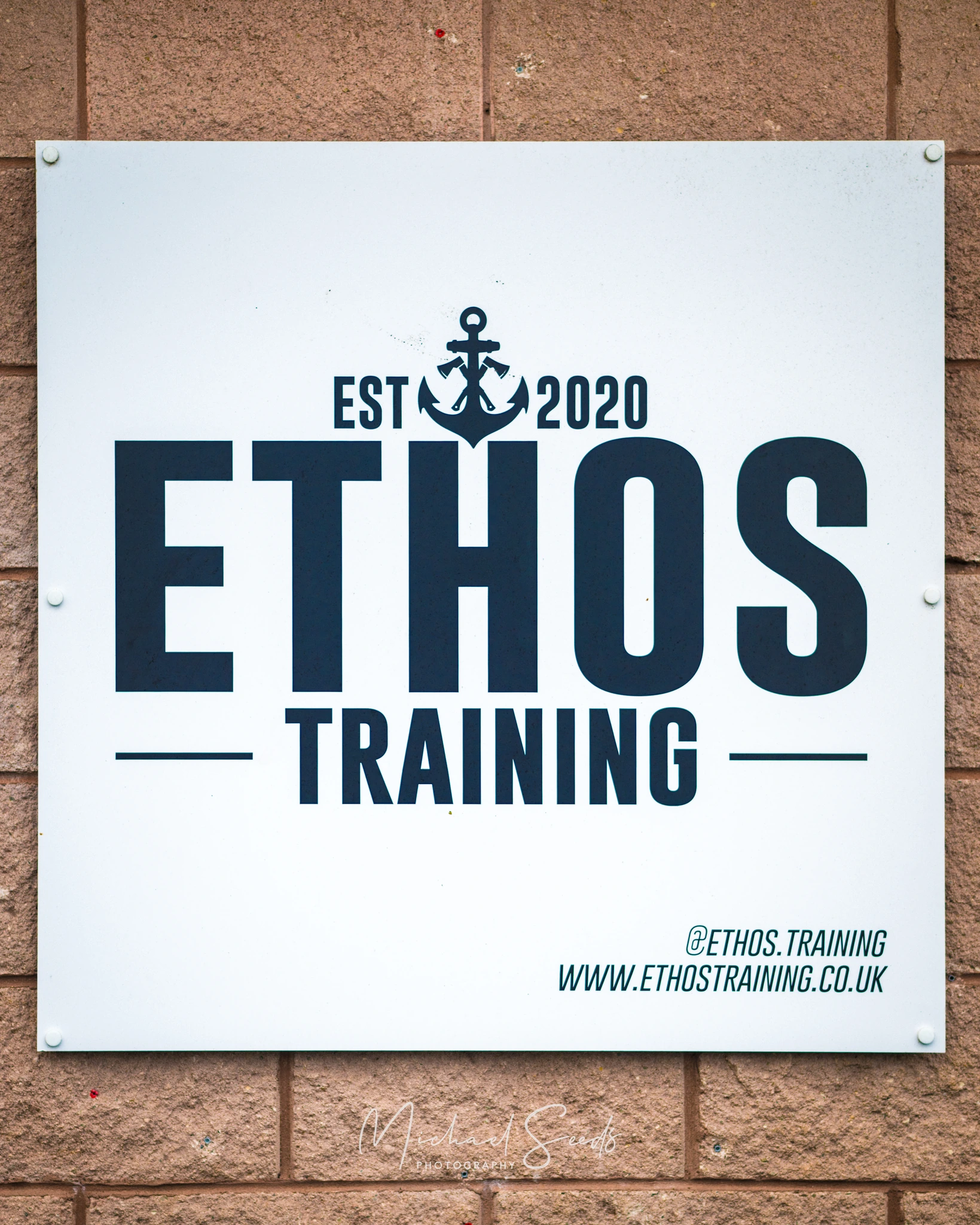ethos training on a wall sign
