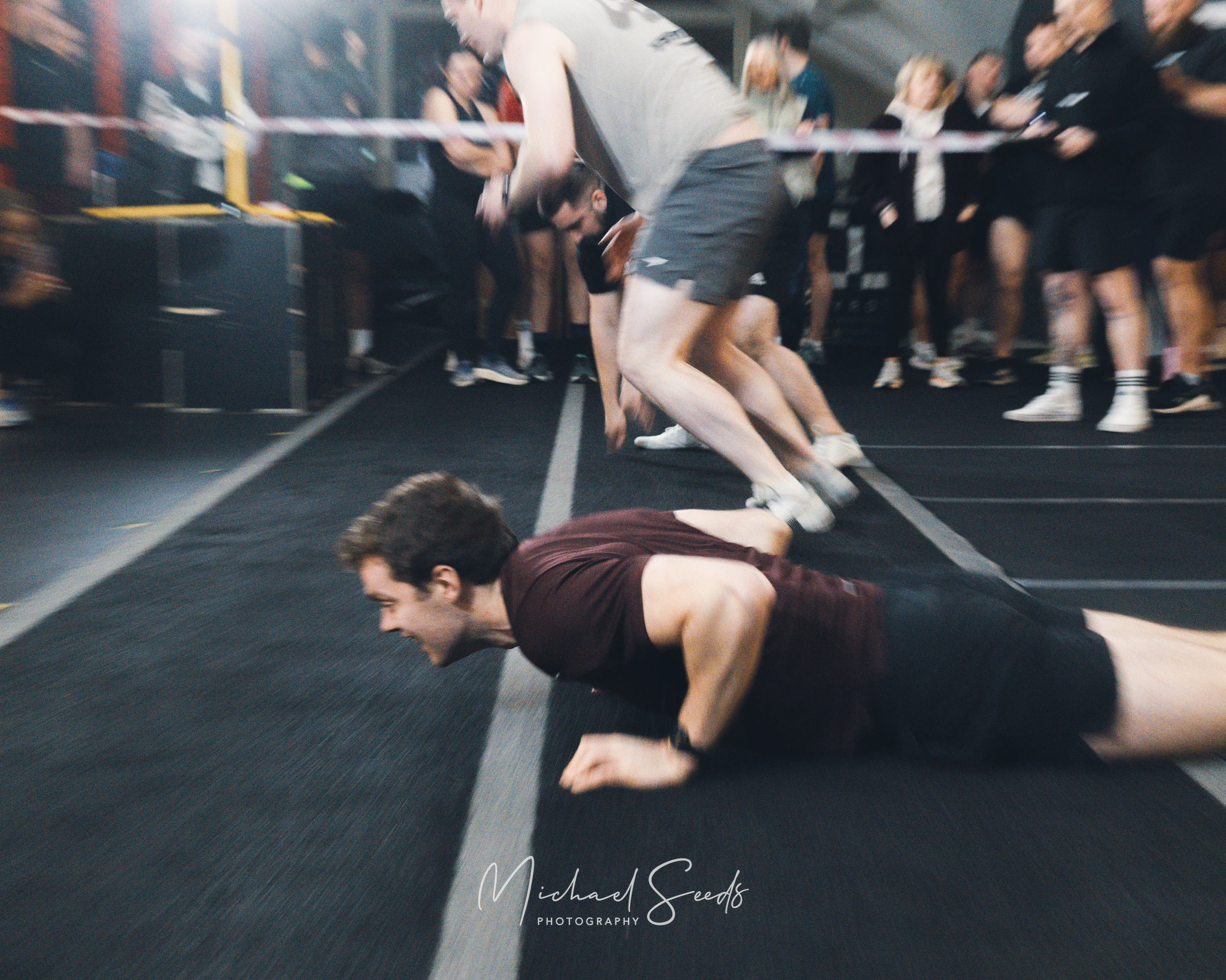 a man doing push ups in a gym