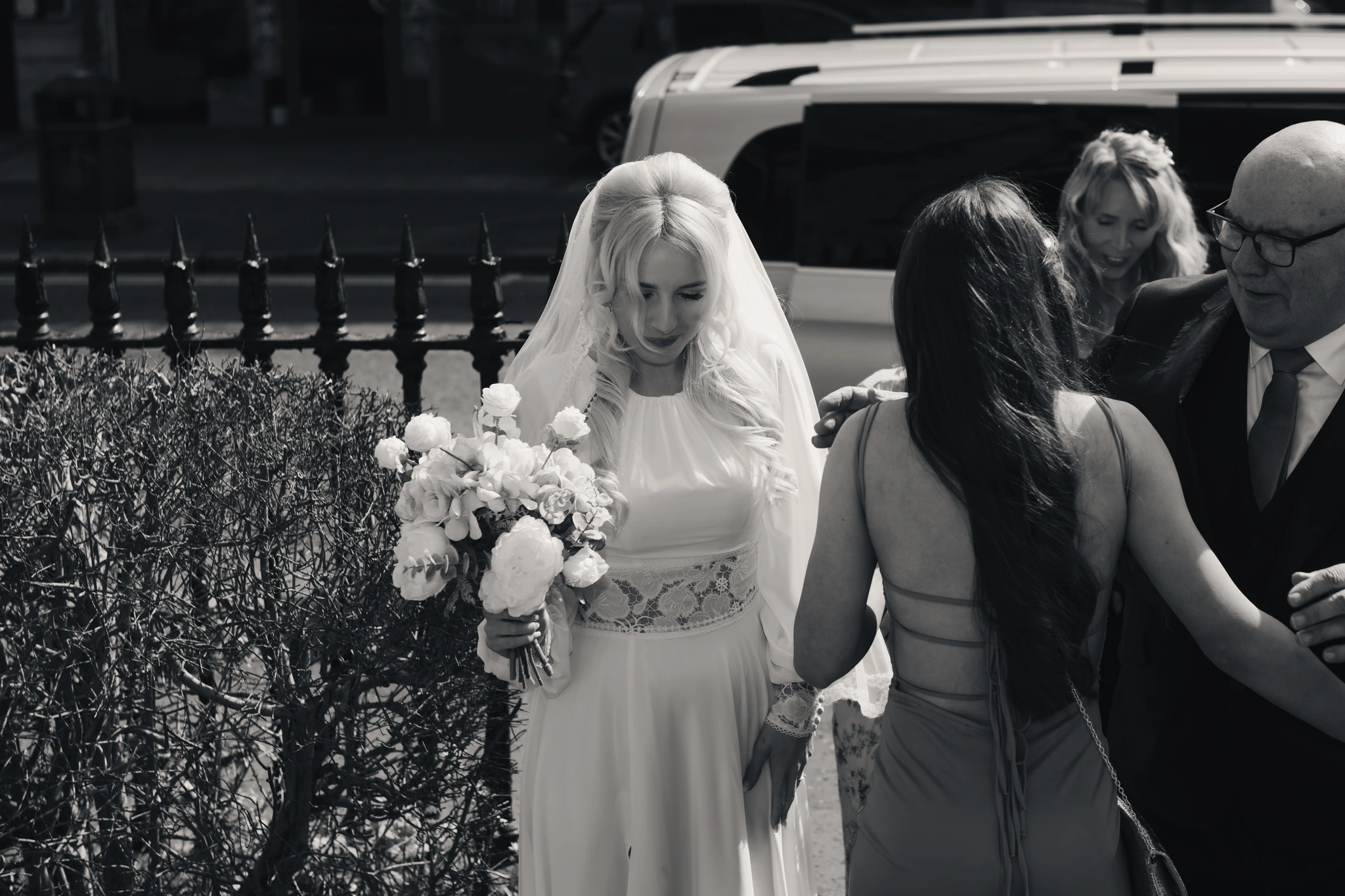 a bride walks down the aisle of a church