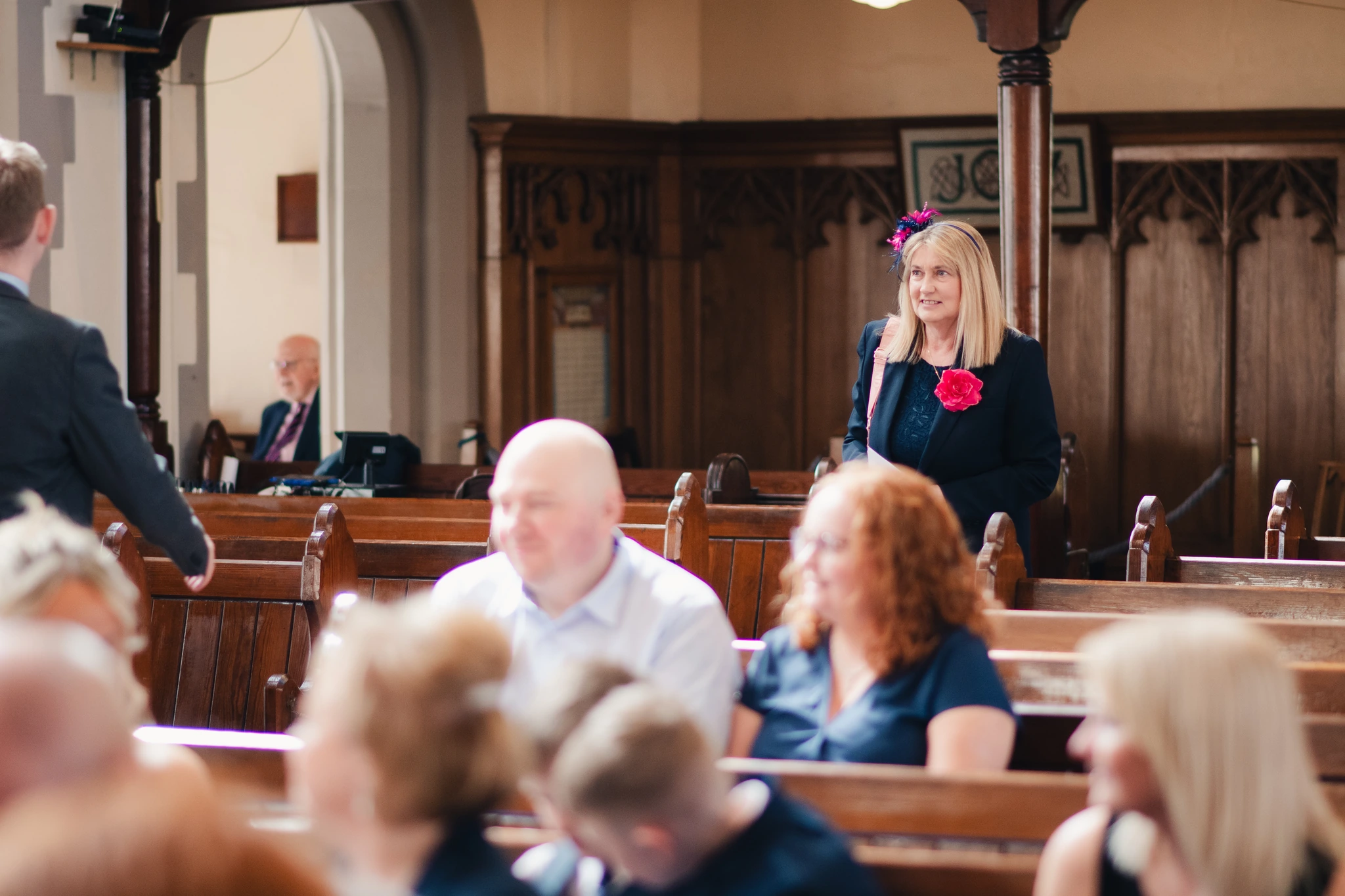 a bride walks down the aisle of a church