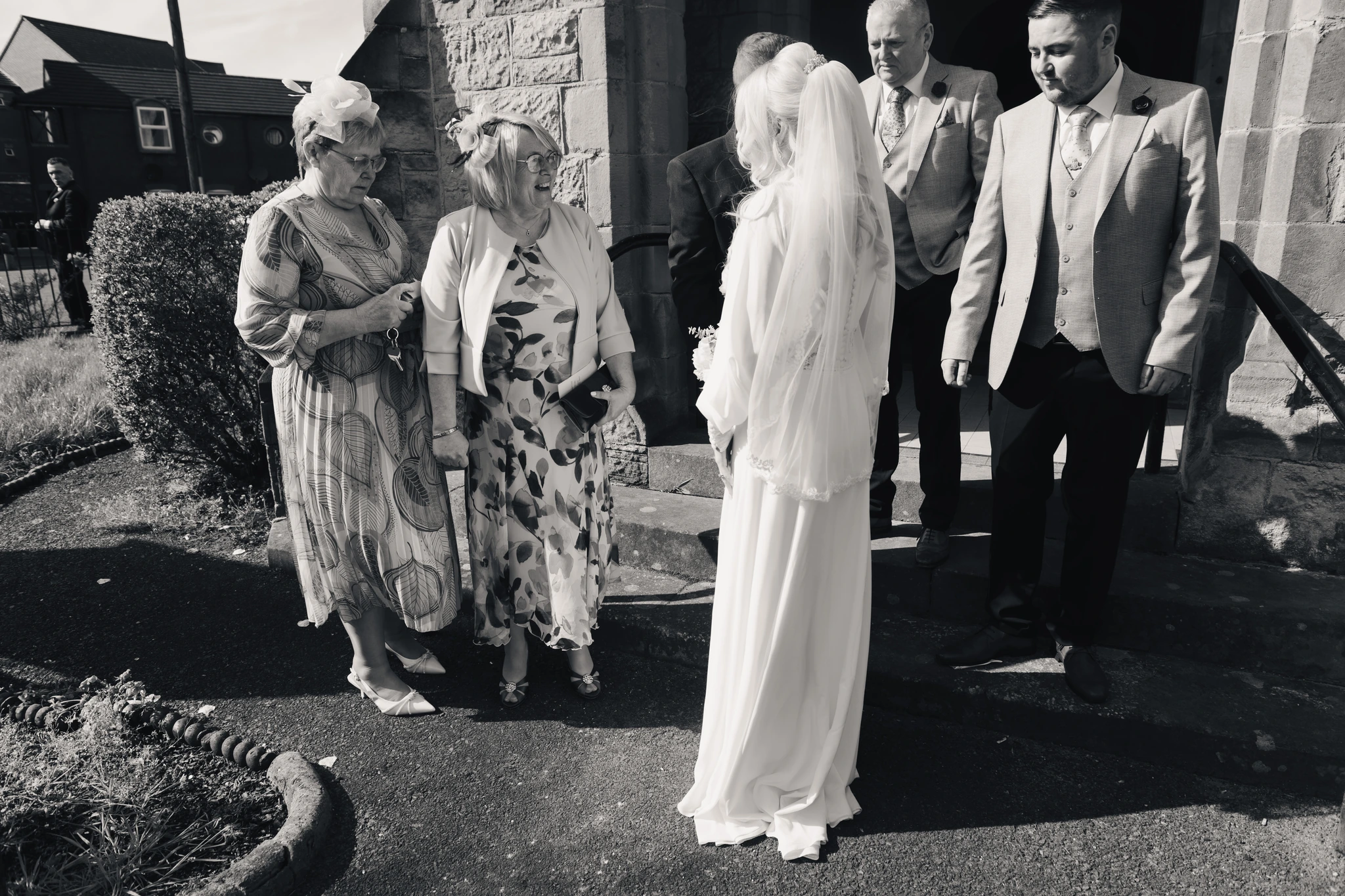 a bride walks down the aisle of a church