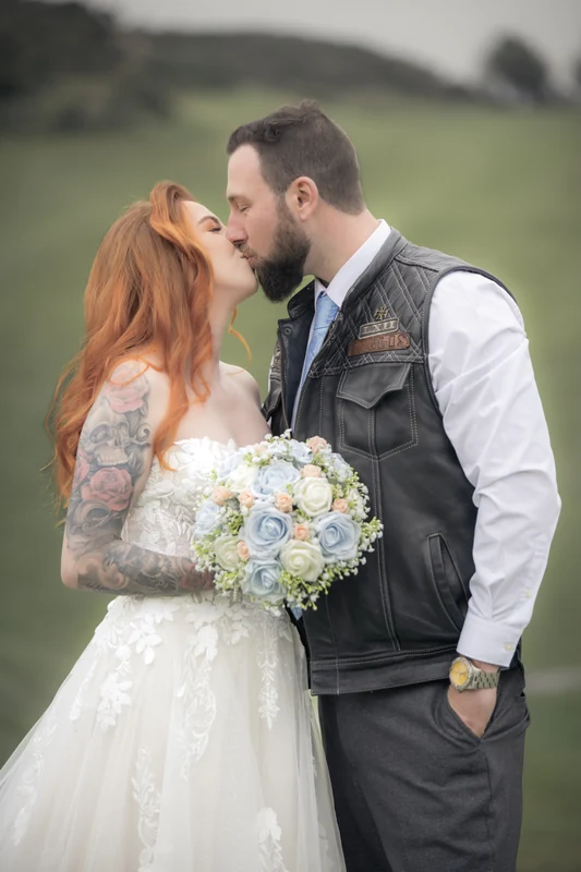 Bride and groom kissing at a wedding in Northern ireland