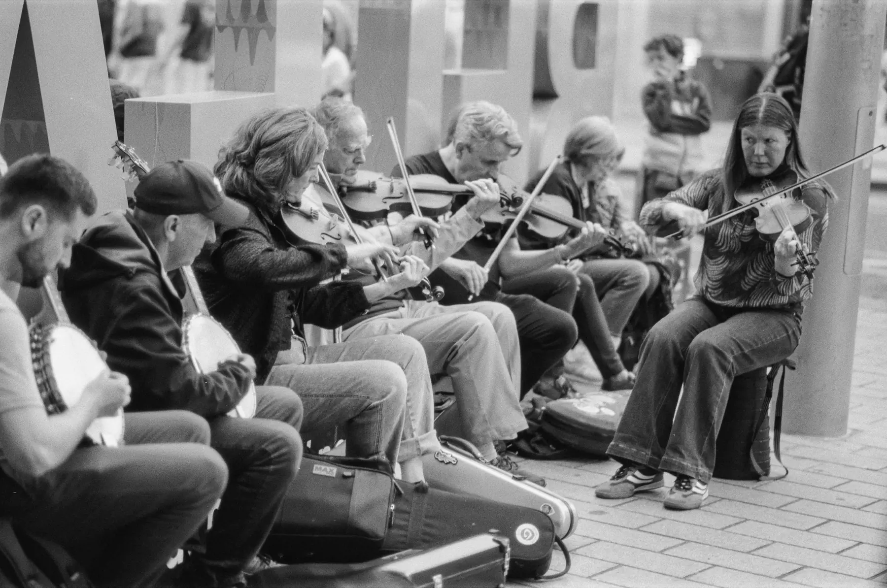 Traditional musicians playing together on the street.